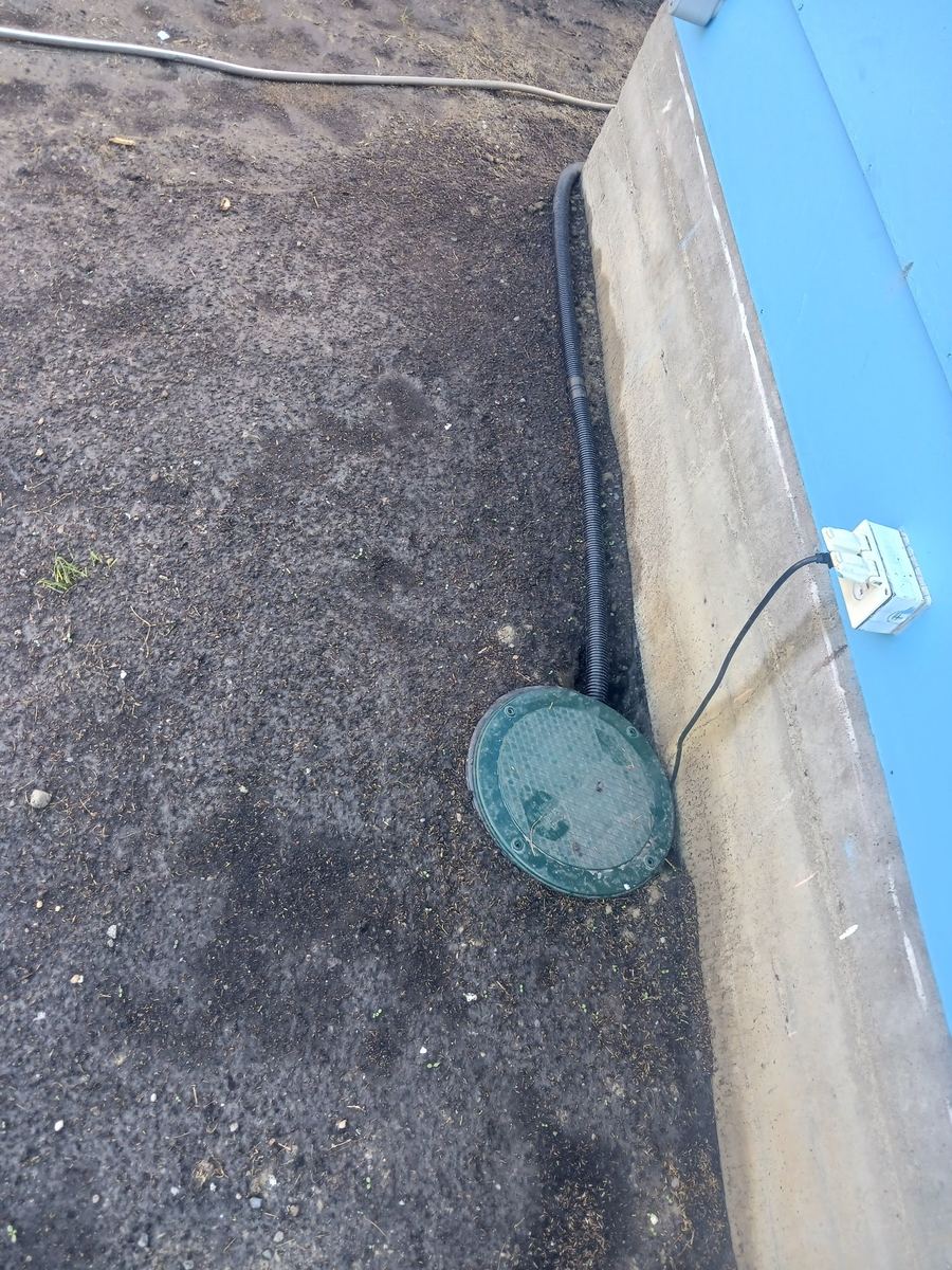 Sump basin cover near foundation